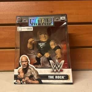 4/$40 WWE’s Dwayne “the Rock” Johnson metal figurine